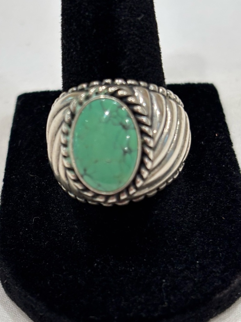 Carolyn Pollack turquoise stone with sterling spiral band ring.